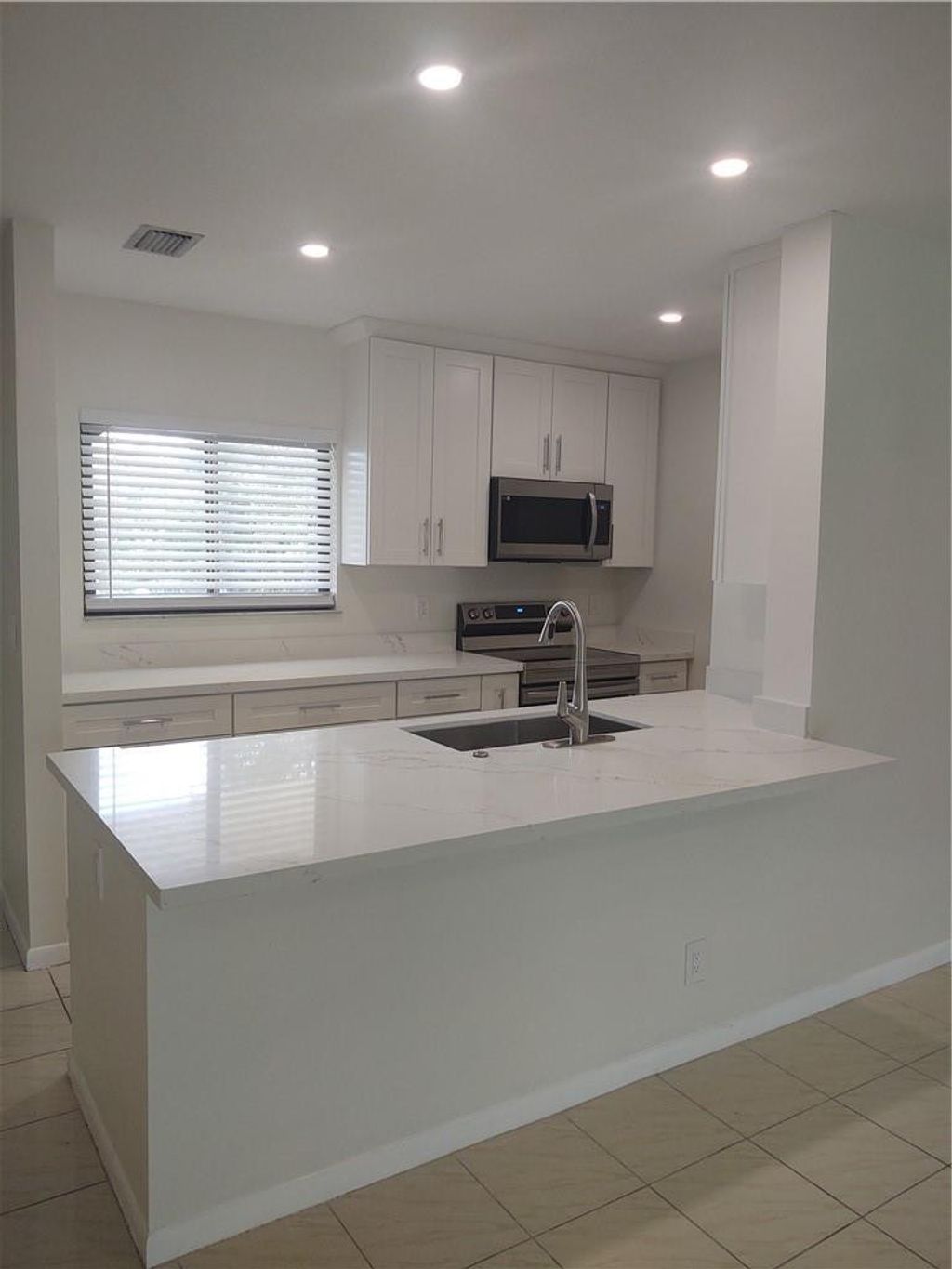 Photo of 130 NW 70th Street #202, Boca Raton, FL 33487 (MLS # F10556425)