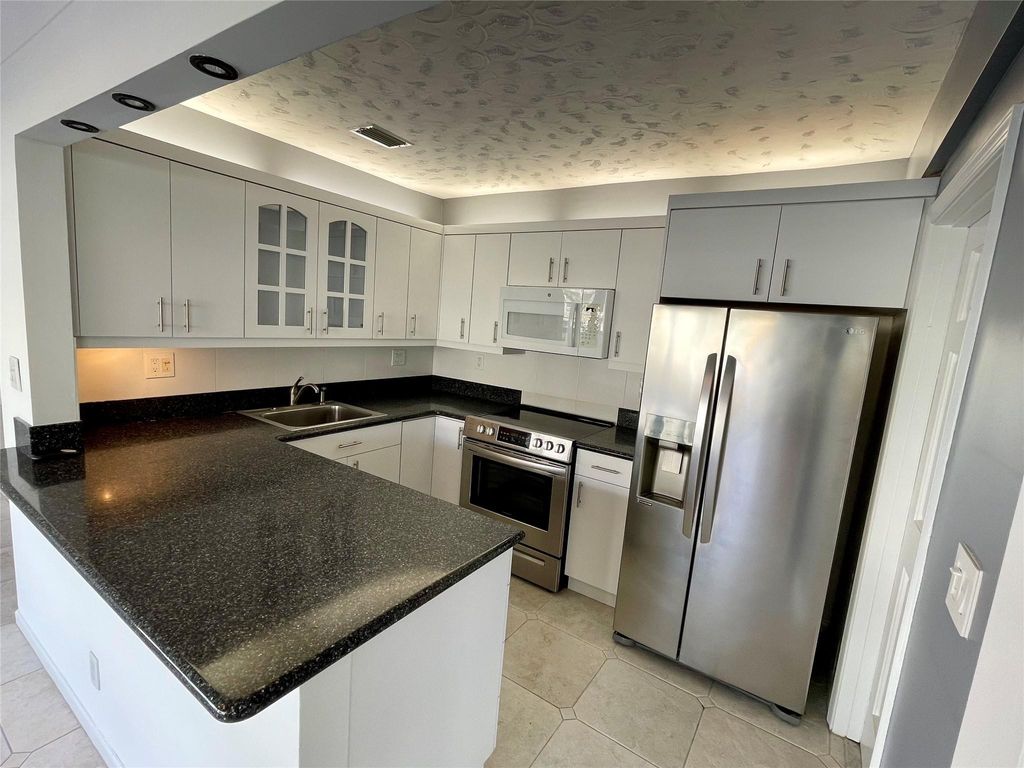 Photo of 3001 NE 47th Court #117, Fort Lauderdale, FL 33308 (MLS # F10472965)