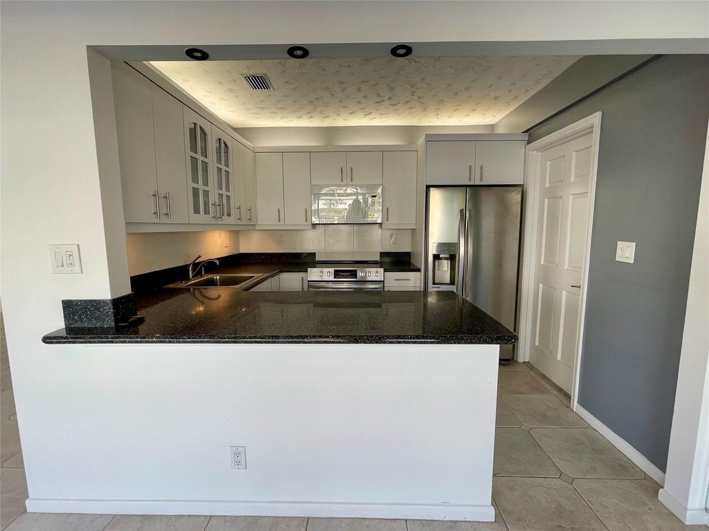 Photo of 3001 NE 47th Court #117, Fort Lauderdale, FL 33308 (MLS # F10472965)