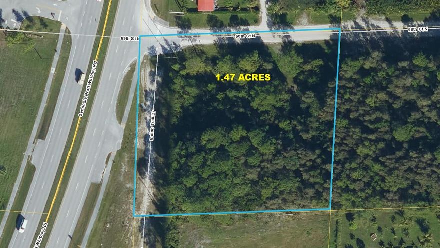 PRIME AG CORNER LOT - HIGH TRAFFIC VISIBILITY ON SEMINOLE PRATT! Exceptional opportunity for an agricultural business or private homestead on this prime 1.47-acre corner lot. Located directly on Seminole Pratt Whitney Rd, this property offers excellent visibility and easy access for a variety of commercial agricultural uses (buyer to verify zoning/permits with the county). The location is a rare find—positioned in the heart of the Royal Palm Beach Acreage, yet only a 5-minute walk to the shopping plaza at Seminole Pratt & Orange Blvd. This is the ideal blend of rural acreage and urban convenience. Don't miss this high-visibility lot!