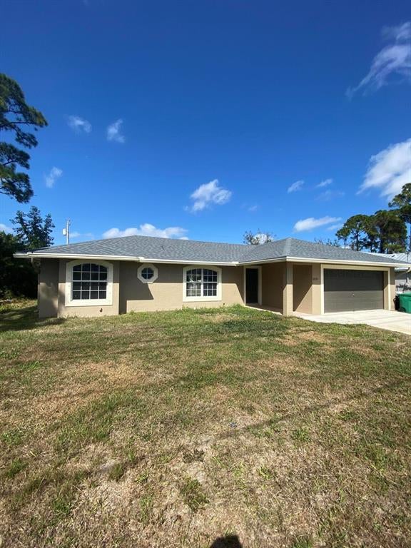 Photo of 2031 SW Del Rio Boulevard, Port Saint Lucie, FL 34953 (MLS # R10779018)