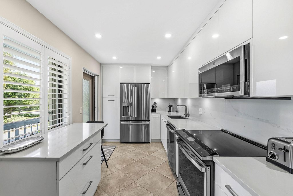 Photo of 4114 Quail Ridge Drive N #Osprey, Boynton Beach, FL 33436 (MLS # B26030774)