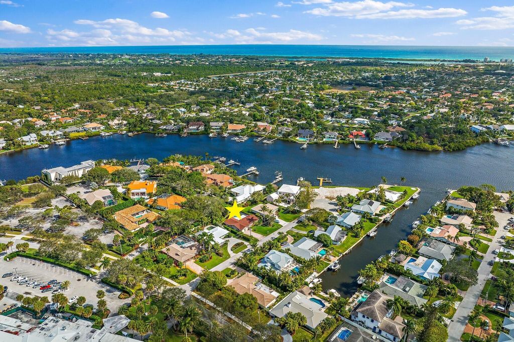 Photo of 11 Country Club Circle, Tequesta, FL 33469 (MLS # R10777209)