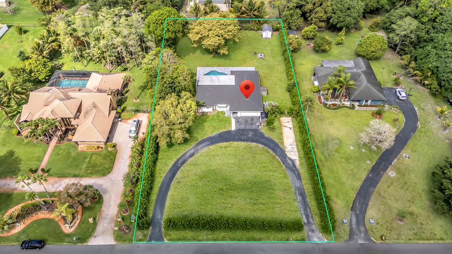 Rare 4 bedroom, 3 bathroom estate home on over 1 acre in prestigious Pine Tree Estates with no HOA, offering the privacy, space, and flexibility today's South Florida buyers are searching for. Surrounded by multi million dollar homes, this property delivers the ideal blend of luxury living and land, a rare find in Broward County real estate. Recent upgrades include a 2024 roof, impact windows and doors, 2024 air conditioning system, and custom built closets. Interior features smooth wall and ceiling finishes, modern baseboards, upgraded interior doors, and beautifully renovated bathrooms with contemporary design. Enjoy a resort style pool with resurfaced finish and marble pool deck, perfect for indoor outdoor living and entertaining. Additional highlights include marble front porch, tile flooring throughout with no carpet, reverse osmosis water filtration system, and a spacious 2 car garage. Ideal for buyers searching for homes with acreage, no HOA restrictions, room for boats, RVs, or expansion, all while being centrally located near top schools, shopping, dining, and major highways. Exceptional opportunity to own a move in ready luxury property with land in one of South Florida's most sought after communities.