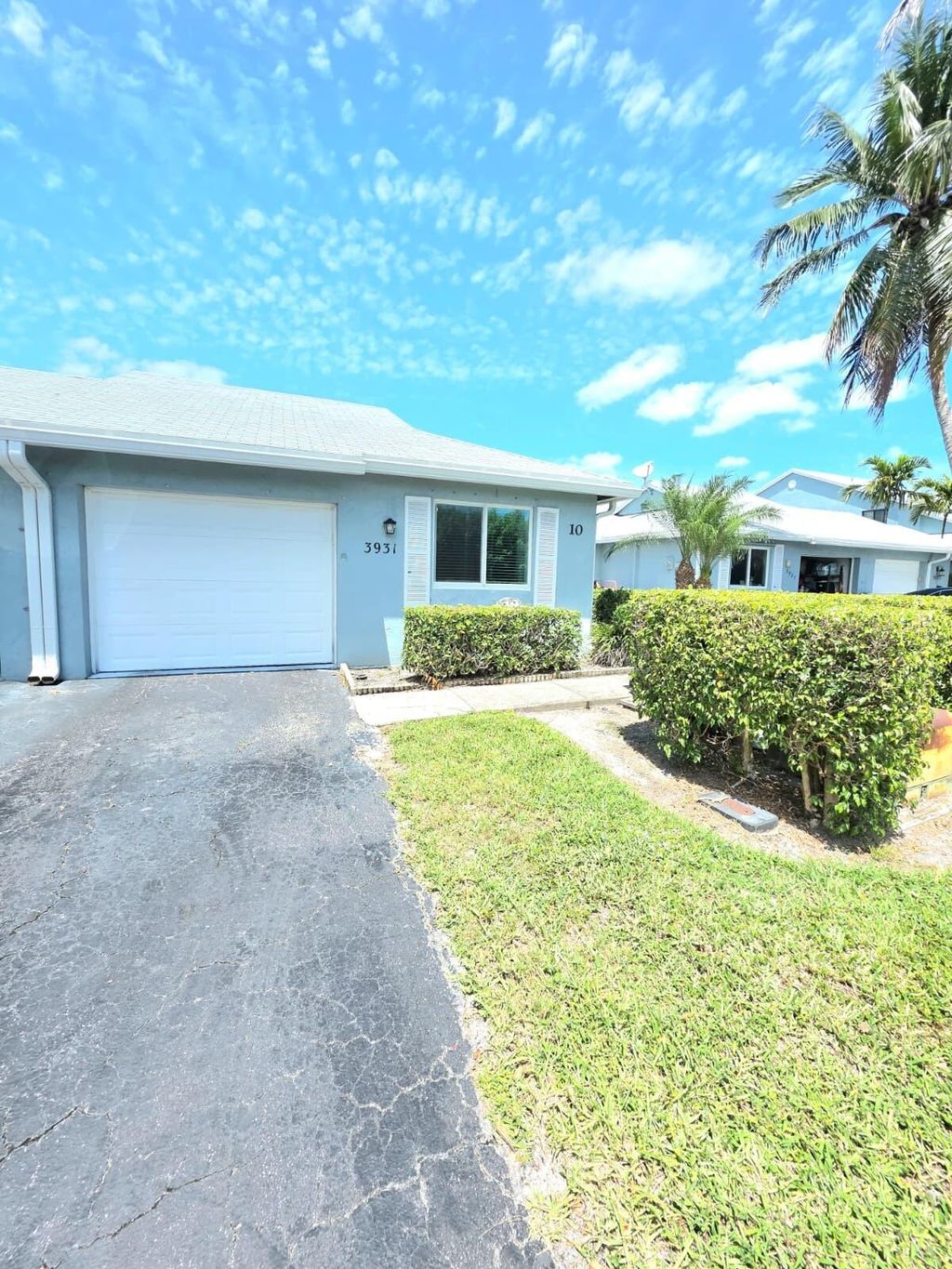 Photo of 3931 Island Club Circle E, Lake Worth, FL 33462 (MLS # B26022816)