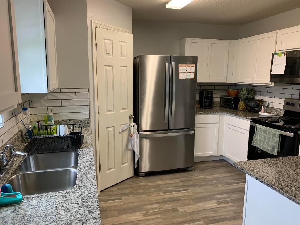 Photo of 413 SW Dolores Avenue, Port Saint Lucie, FL 34983 (MLS # R10932619)