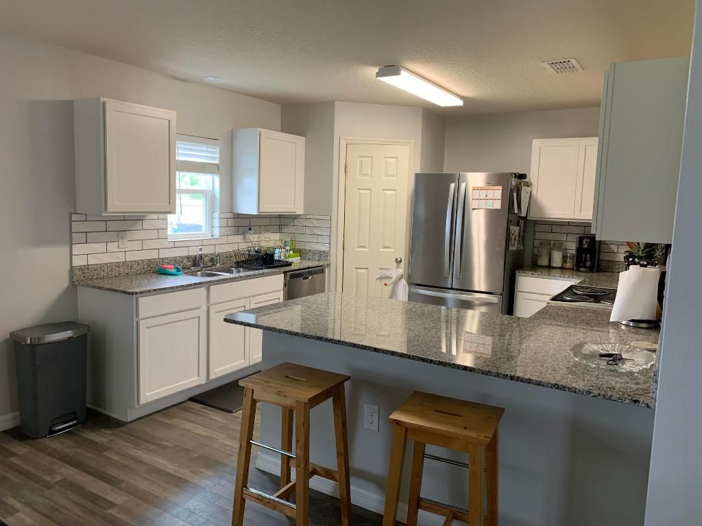 Photo of 413 SW Dolores Avenue, Port Saint Lucie, FL 34983 (MLS # R10932619)