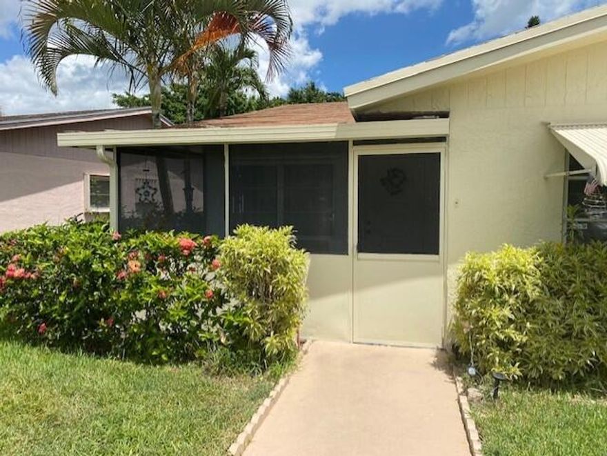 Corner unit 2/2 +Den Villa with front and back screened porches. Water view. Private driveway in front. Satellite pool in walking distance. Low HOA very active 55+ community with many activities. Pet friendly. Short distance to downtown Delray and beaches