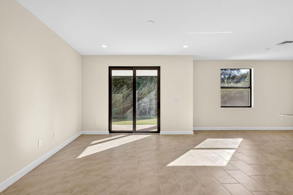 Photo of 103 SW Seminole Crossing Street, Indiantown, FL 34956 (MLS # R11161107)