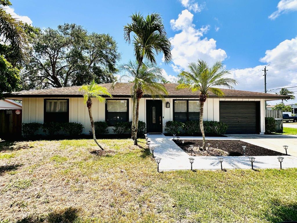 Photo of 3390 Artesian Drive, Lake Worth, FL 33462 (MLS # B26022837)