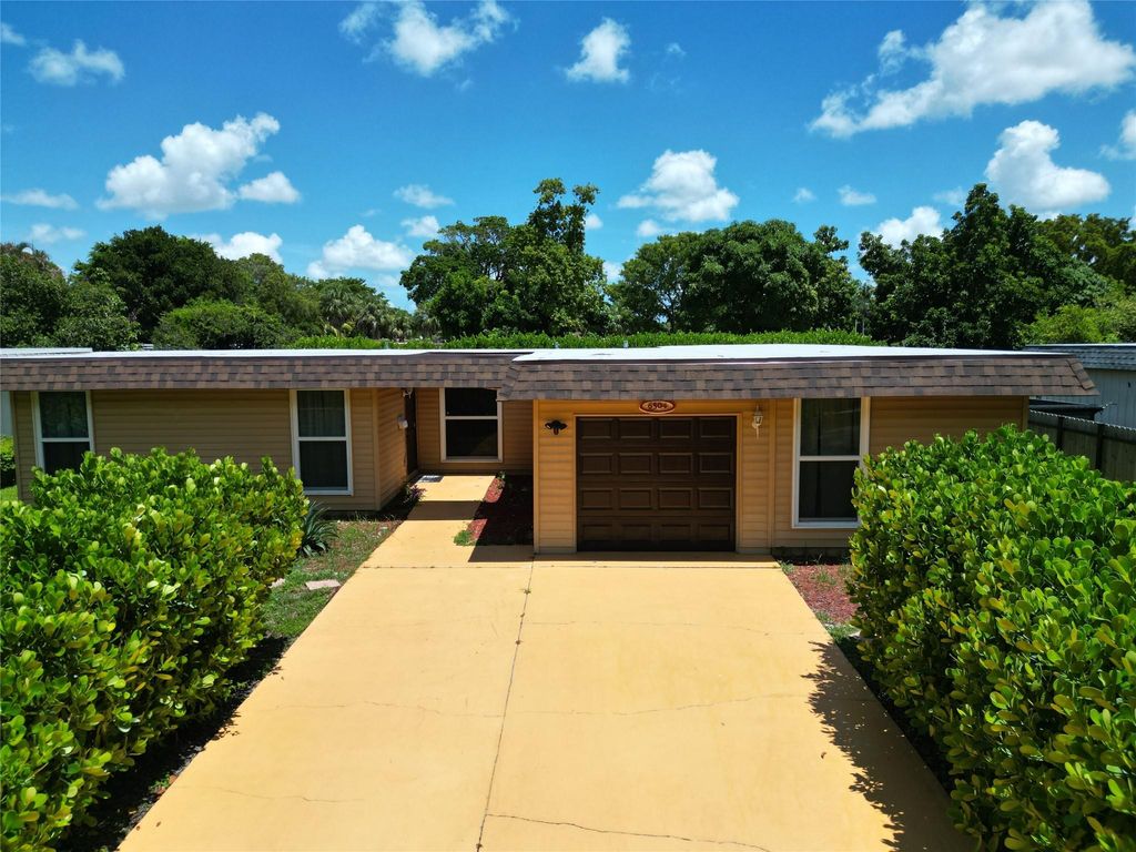 Photo of 6504 NW 74th Ave, Tamarac, FL 33321 (MLS # F10518432)