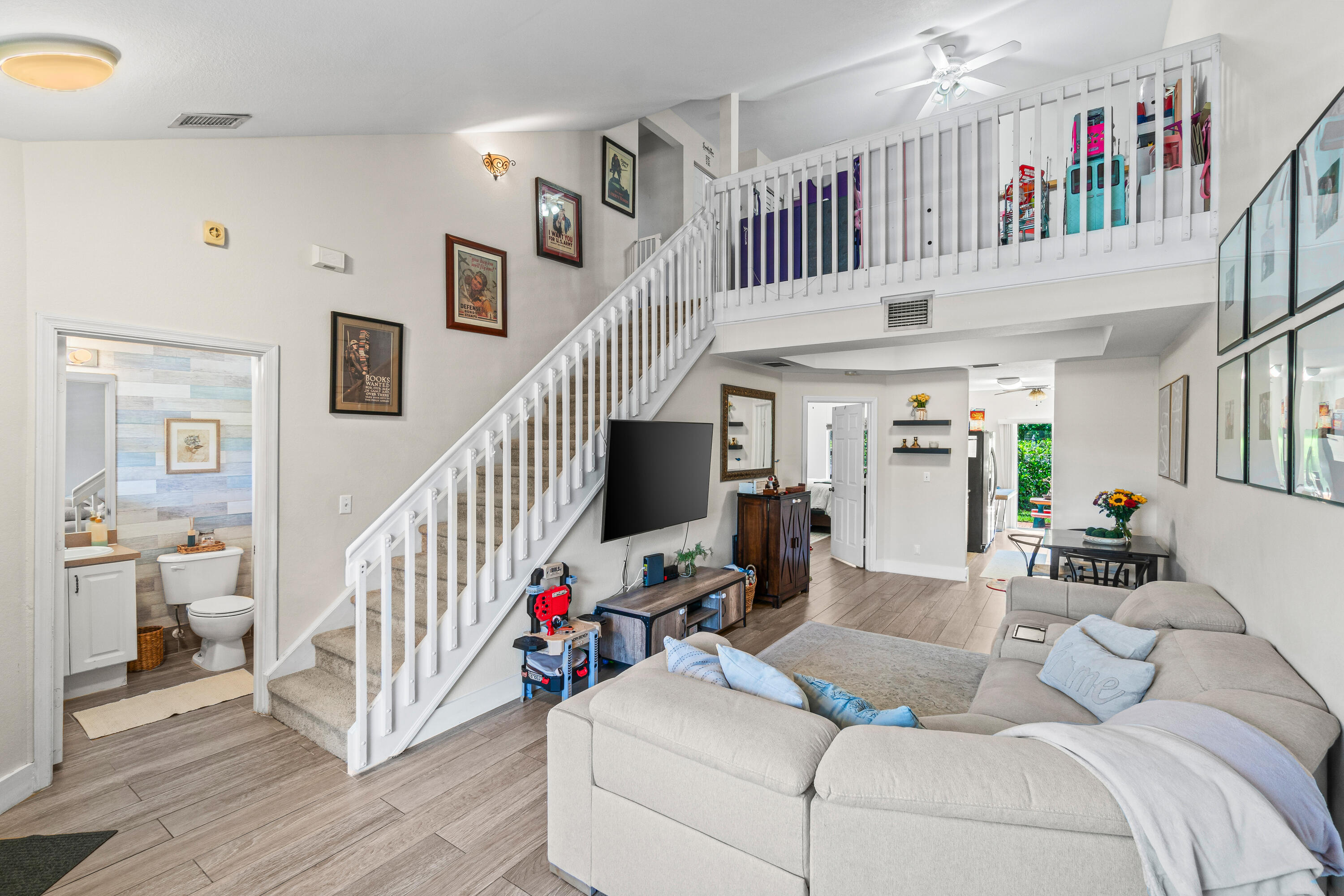 LOCATION LOCATION. This beautiful property is located in Boynton Beach just off of Federal Highway and provides the ultimate convenience for easy living. The home boasts a downstairs master, vaulted ceilings, upgraded kitchen and spacious living indoor and out! Upstairs provides a large landing/loft with 2 additional bedrooms. The neighborhood is just 5 minutes to downtown Delray, a mile to the beach and located to the best shopping and restaurants in South Florida.