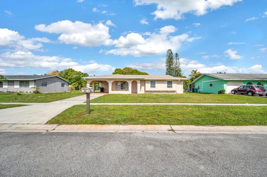 Photo of 241 NE Ardsley Drive, Port Saint Lucie, FL 34983 (MLS # R10962097)