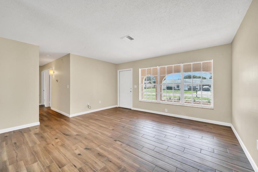 Photo of 241 NE Ardsley Drive, Port Saint Lucie, FL 34983 (MLS # R10962097)