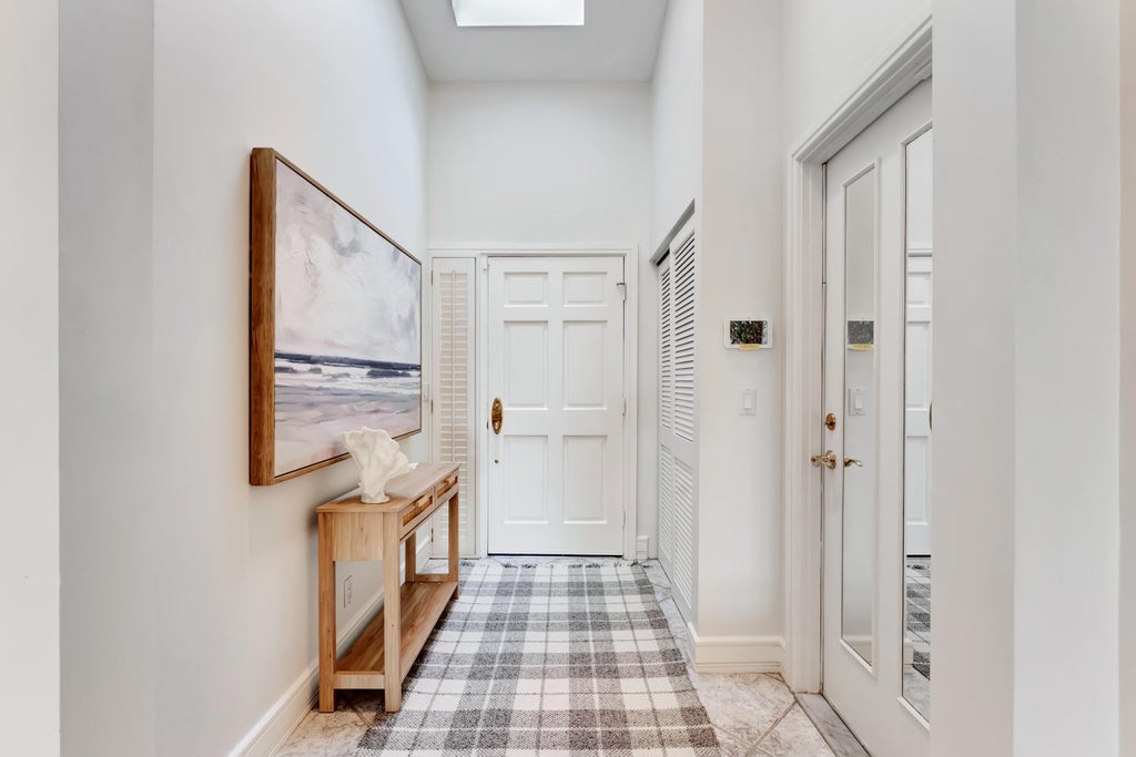 Photo of 310 SPYGLASS Way, Jupiter, FL 33477 (MLS # B26088444)