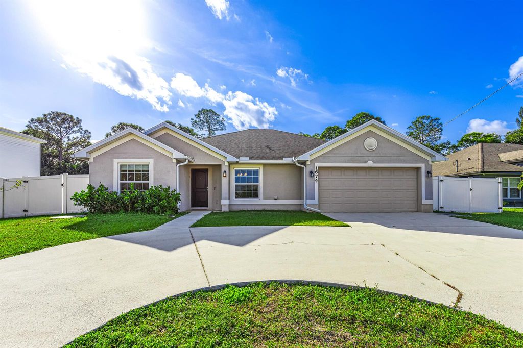Photo of 1674 SW Airoso Boulevard, Port Saint Lucie, FL 34984 (MLS # R11091521)