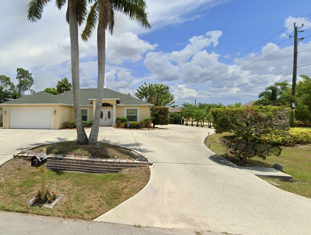 Photo of 1301 SW BABCOCK Avenue, Port Saint Lucie, FL 34953 (MLS # B26077209)