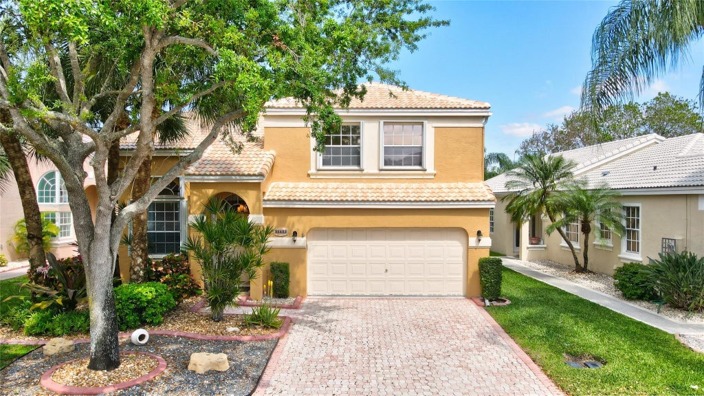 Photo of 11433 NW 49th Drive, Coral Springs, FL 33076 (MLS # F10532818)
