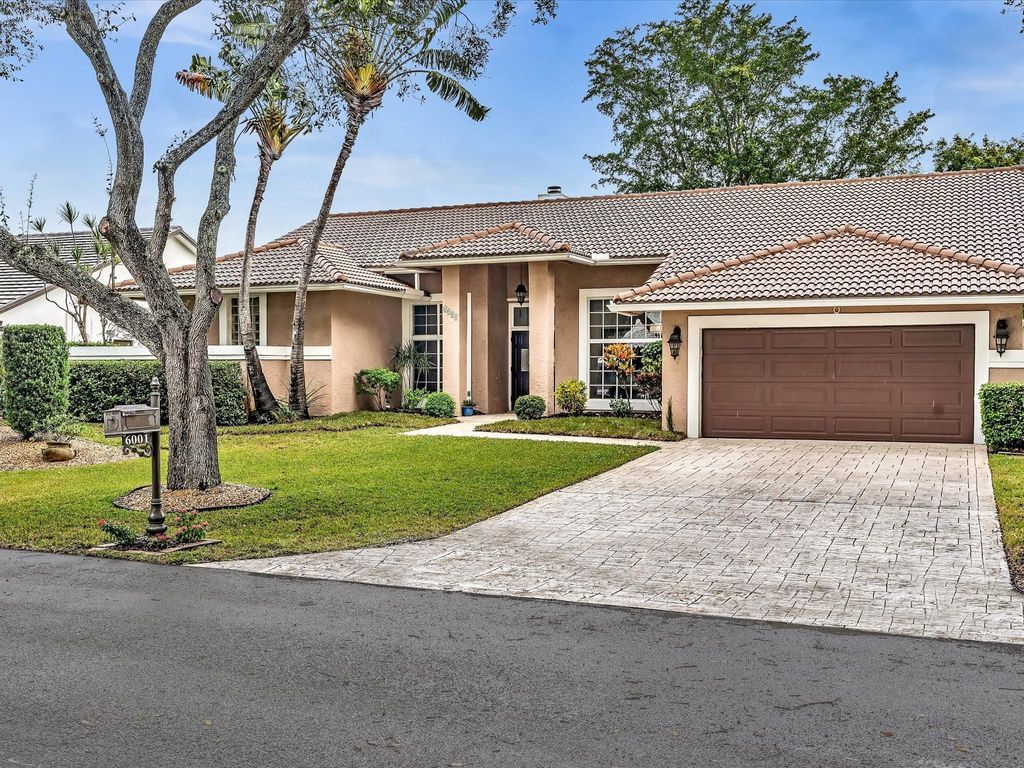 Photo of 6001 NW 63rd Place, Parkland, FL 33067 (MLS # F10413376)