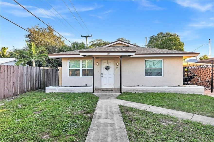 Beautiful completely remodeled 2 bed 2 bath single family house. Walking distance to stores ,shopping and restaurants. New roof, impact glass throughout, New central AC ,Laundry room with new washer and dryer ,alarm system ,newly painted inside and out with porcelain tile floors, granite countertops, all top new appliances, a lot of closet space and outdoor cover patio with back yard area.