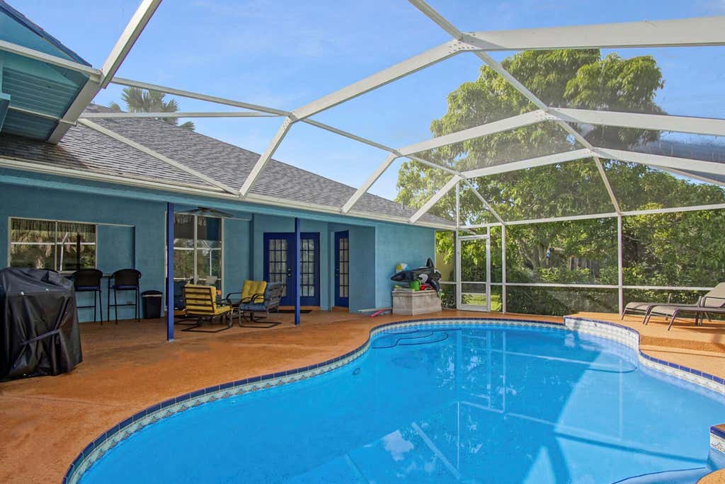 Photo of 3119 SW Ann Arbor Road, Port St Lucie, FL 34953 (MLS # R10918580)