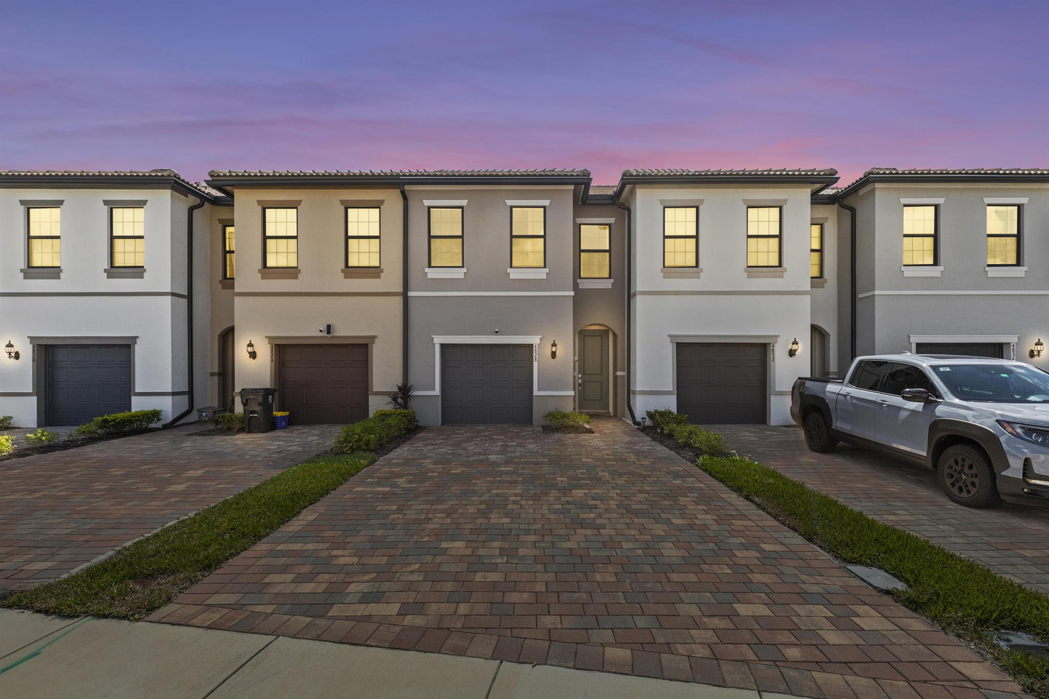 Welcome to Your Next Home in The Fields - Built in 2023 This beautifully maintained 3-bed, 2.5-bath townhouse offers the perfect blend of modern design and a warm, inviting feel. Located in the sought-after The Fields community, known for its peaceful atmosphere and resort-style amenities tailored for all ages this home is move-in ready. Step inside to find an open-concept layout, high ceilings, and abundant natural light. The gourmet kitchen, stainless steel appliances, a large center island, perfect for everyday meals or entertaining guests. Schedule your showing right away this one will not last!