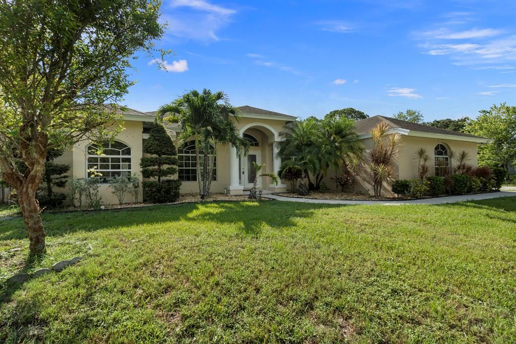 Photo of 4117 SW Rosser Boulevard Blvd, Port St Lucie, FL 34953 (MLS # R10812002)