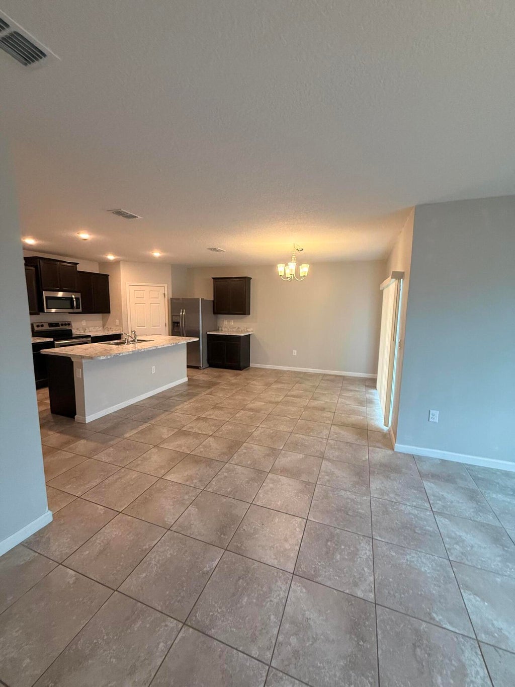 Photo of 619 SW Post Terrace, Port Saint Lucie, FL 34953 (MLS # B26009762)
