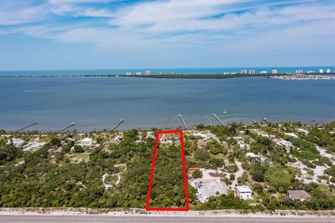 Photo of 12123 S Indian River Drive, Jensen Beach, FL 34957 (MLS # R10896493)