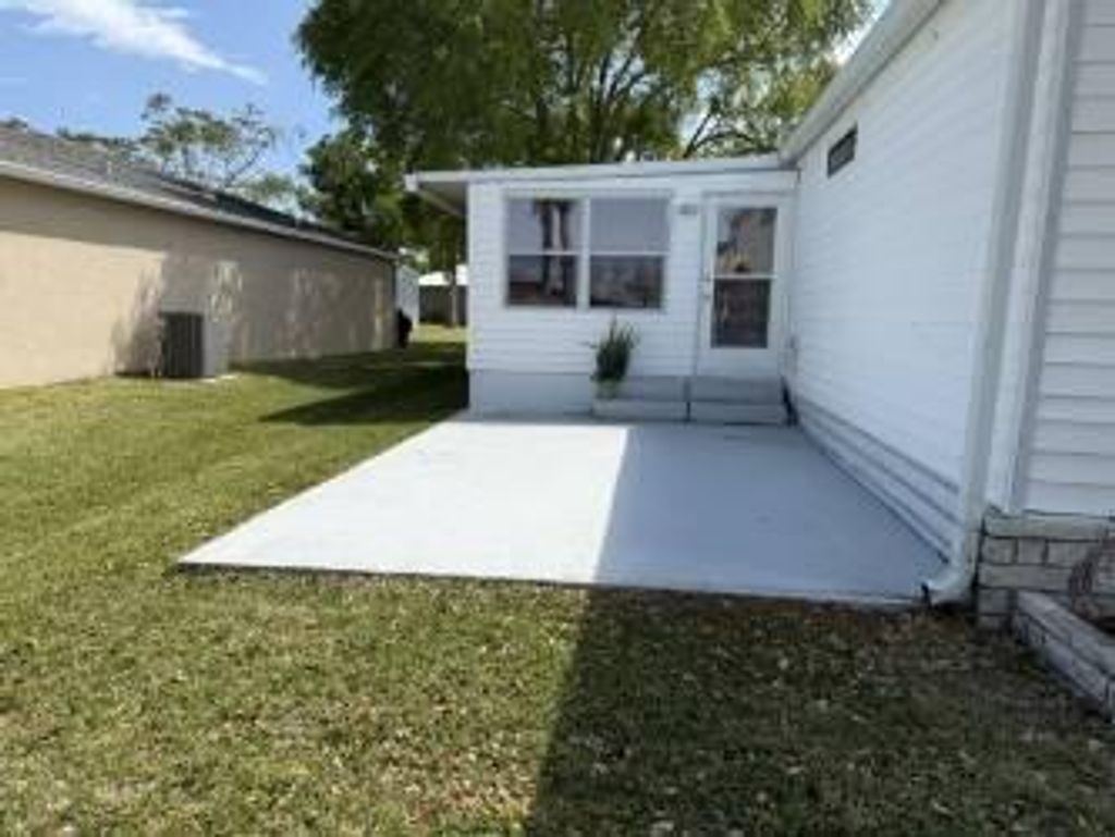 Photo of 14577 Dulce Real Avenue, Fort Pierce, FL 34951 (MLS # R11080294)