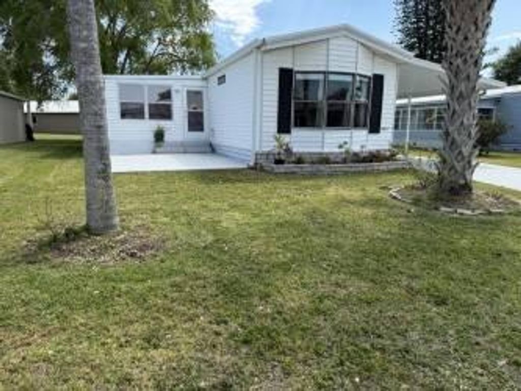 Photo of 14577 Dulce Real Avenue, Fort Pierce, FL 34951 (MLS # R11080294)