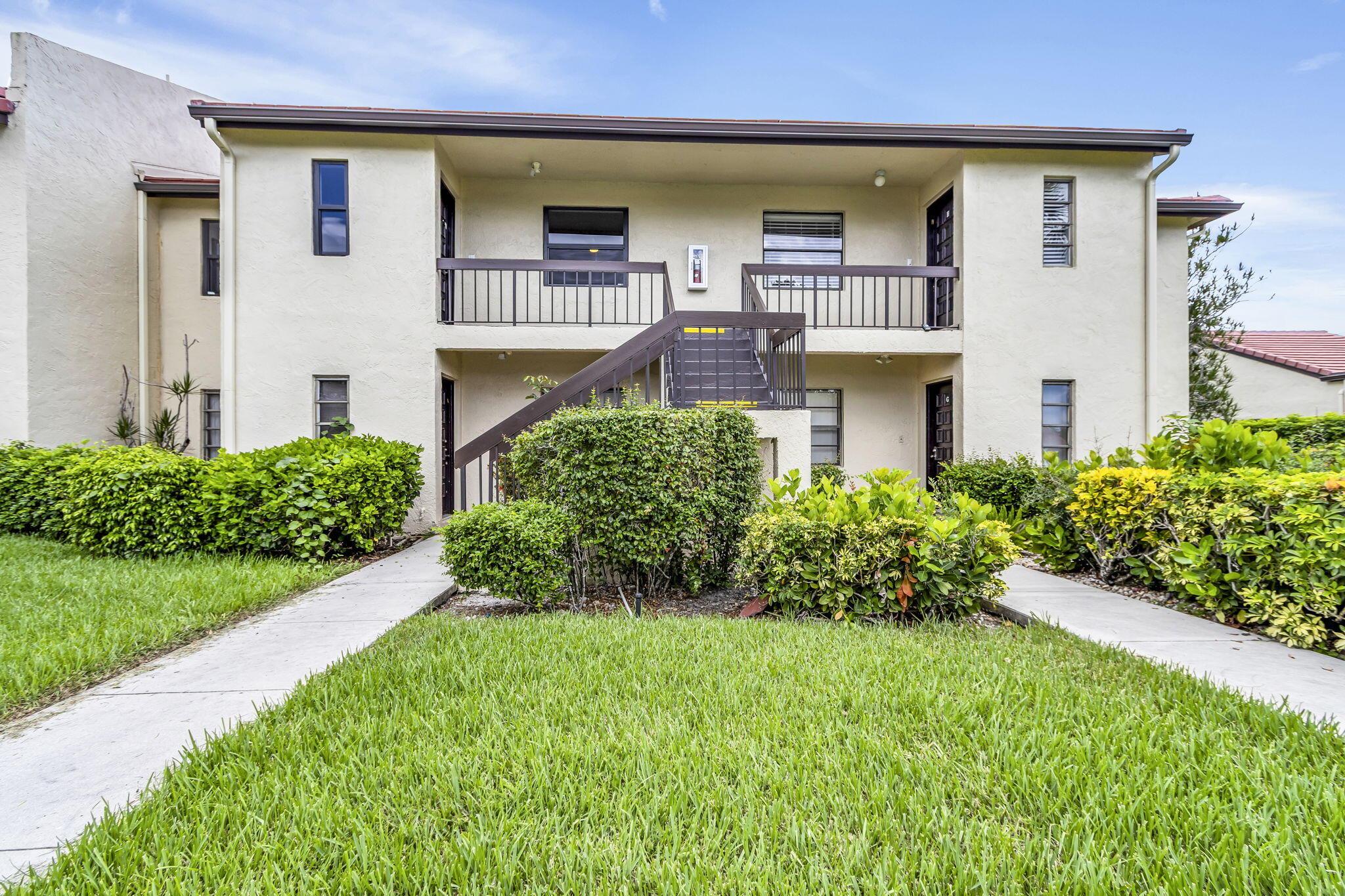 Be the 1st to live in this Beautifully renovated 2 bedroom 2 bath condo with open floor plan, very light bright and spacious - neutral colors thru out Kitchen featuring 42'' white wood cabinets, stainless appliances and quartz waterfall counter. Impact windows thru out except for balcony. Bathrooms with frameless shower doors and tastefully renovated Sip your morning coffee on the covered enclosed patio with tranquil views of the golf course. 55+ Adult gated community with a pool for the residents enjoyment. Centrally located to shopping restaurants major highways and min to beaches Come view today