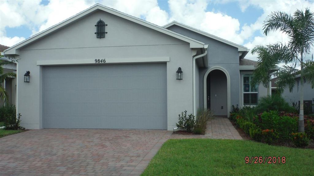 Photo of 9846 SW Trumpet Tree Circle, Port Saint Lucie, FL 34987 (MLS # R10800406)