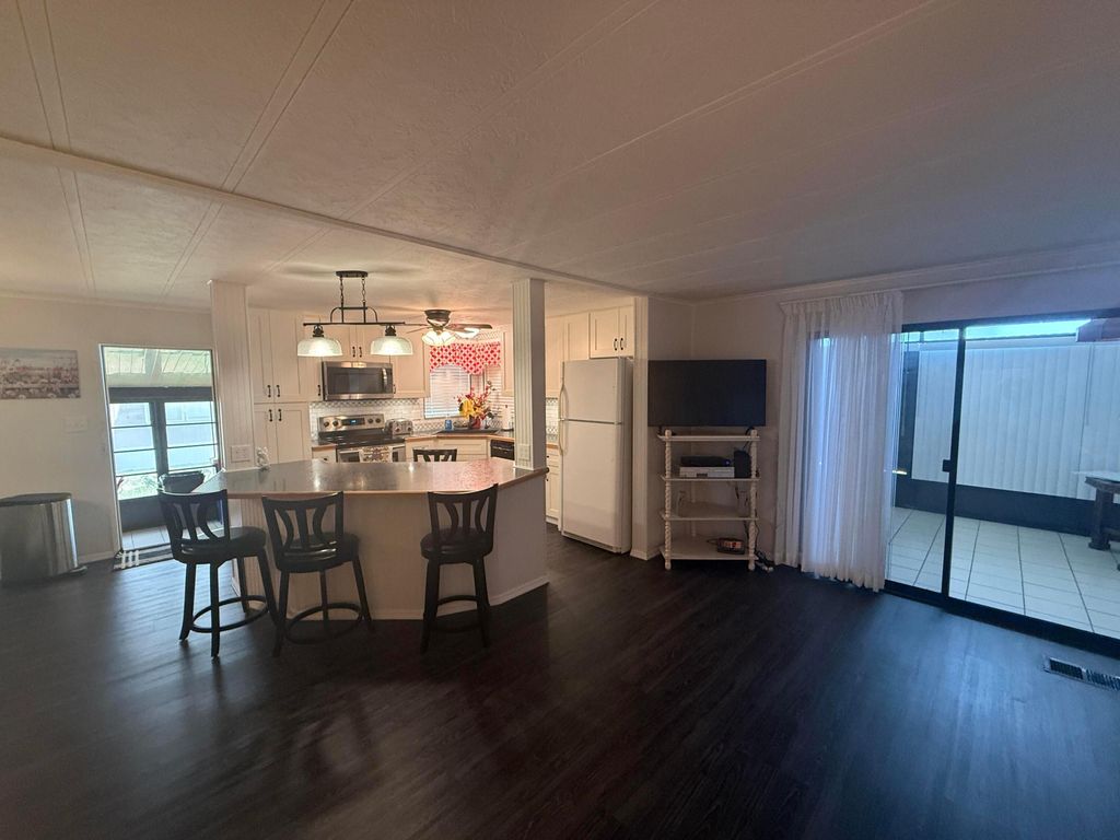 Photo of 8044 SE Patriot Avenue, Hobe Sound, FL 33455 (MLS # B26023987)