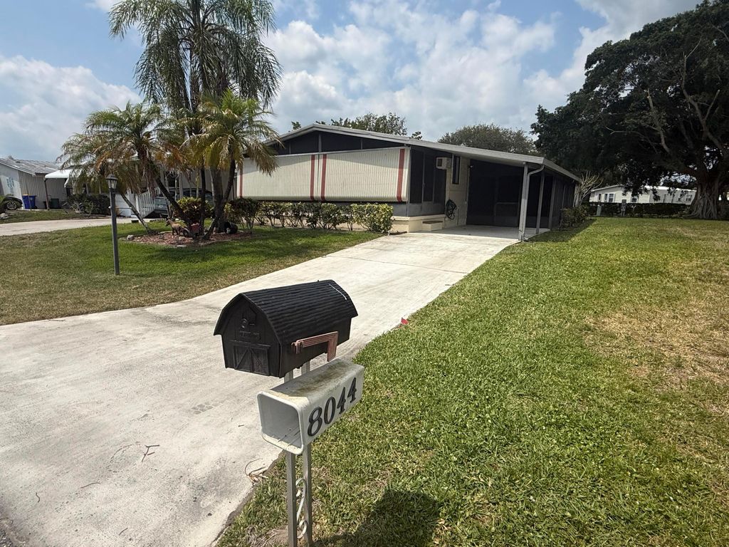 Photo of 8044 SE Patriot Avenue, Hobe Sound, FL 33455 (MLS # B26023987)