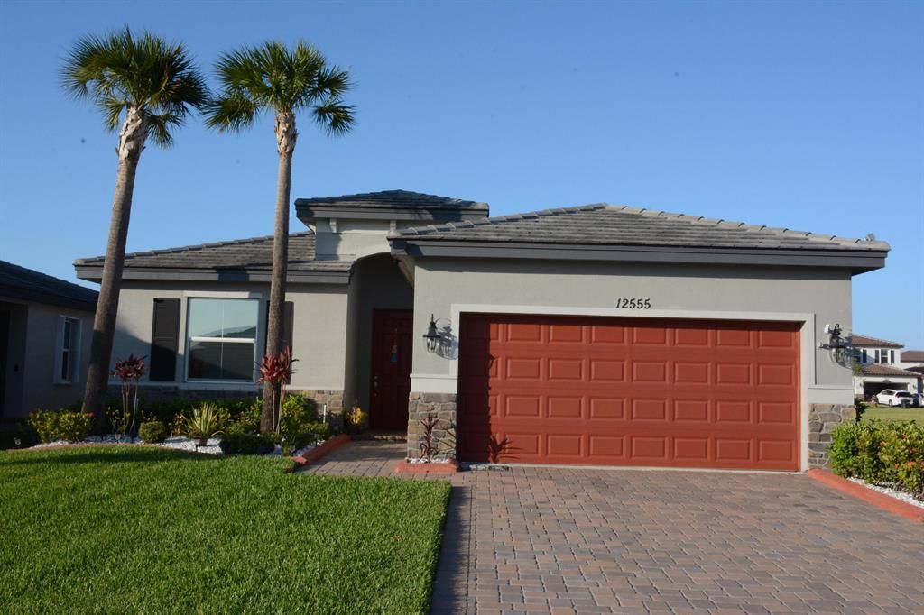 Photo of 12555 NW Milestone Place, Port Saint Lucie, FL 34987 (MLS # R10718865)