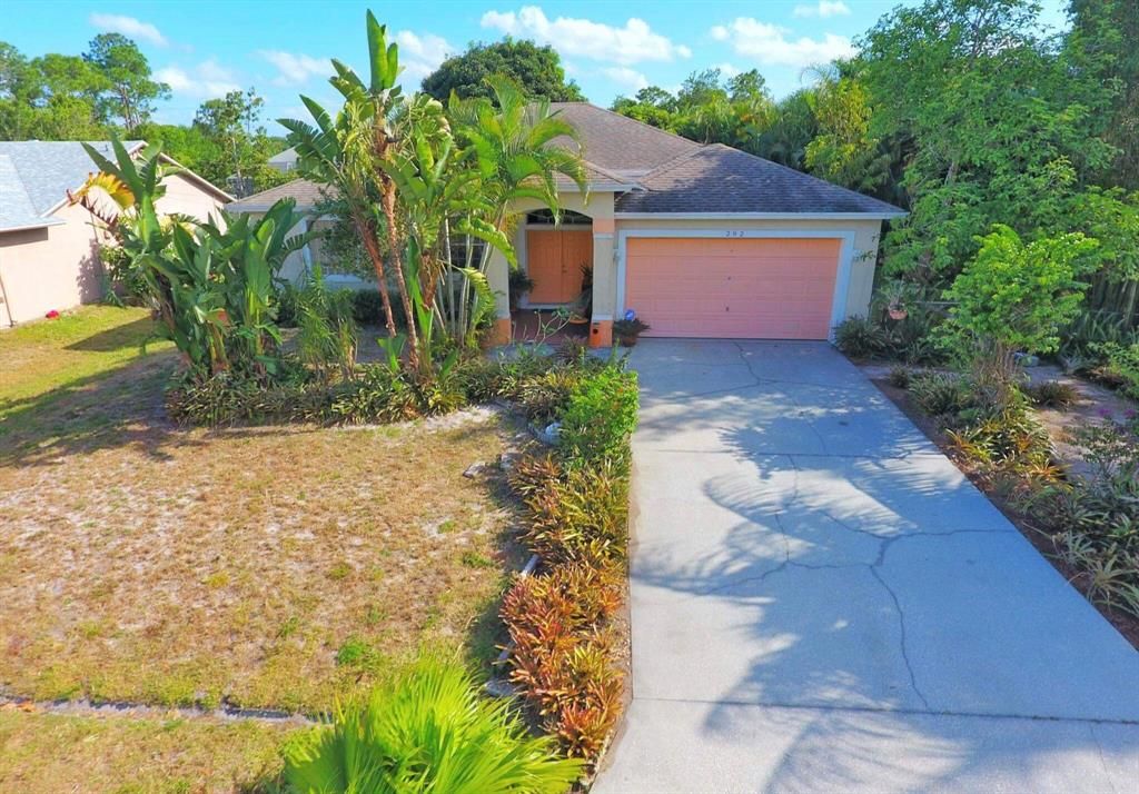 Photo of 292 SW Moselle Avenue, Port Saint Lucie, FL 34984 (MLS # R10796338)