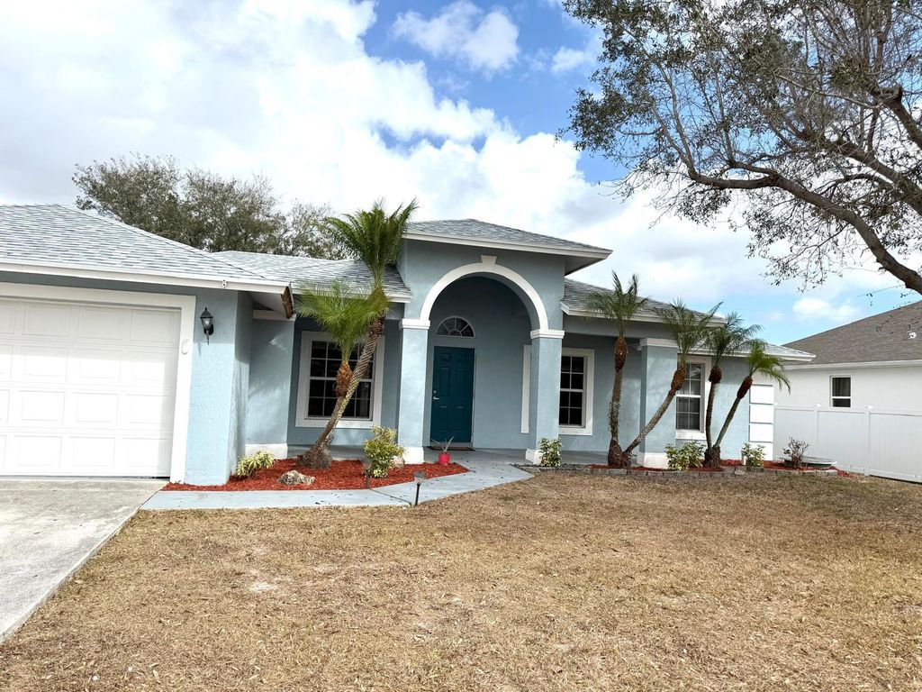 Photo of 549 SW Prater Avenue, Port Saint Lucie, FL 34953 (MLS # R11114145)