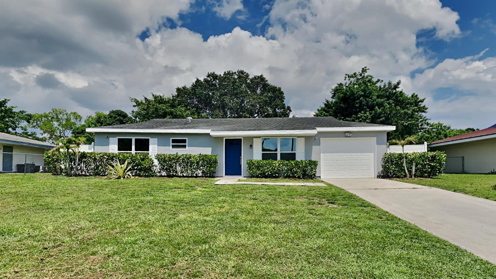 Photo of 473 SW Kentwood Road, Port St Lucie, FL 34953 (MLS # R10901605)