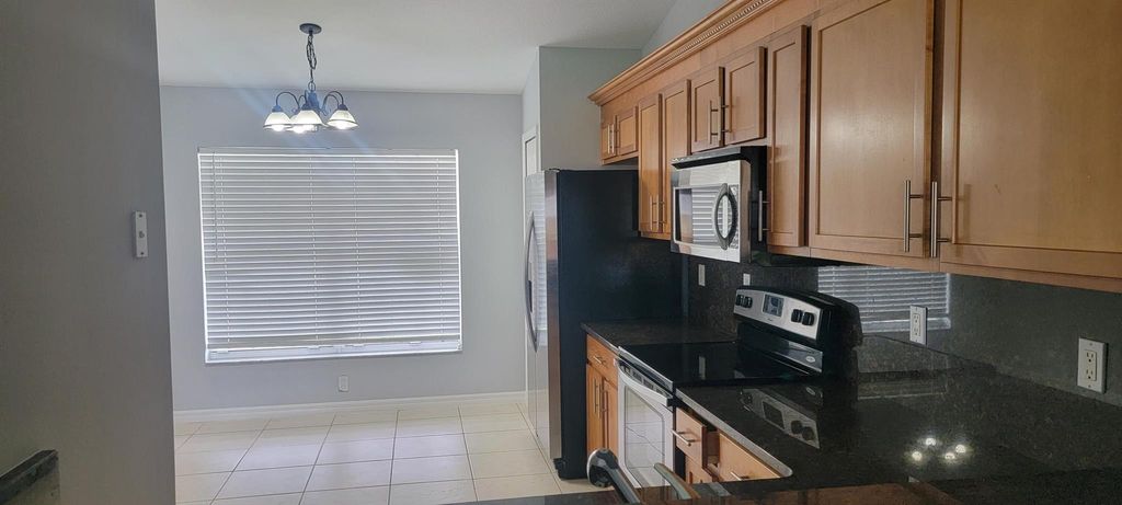 Photo of 437 NE Mainsail Street NE, Port Saint Lucie, FL 34983 (MLS # R11010505)