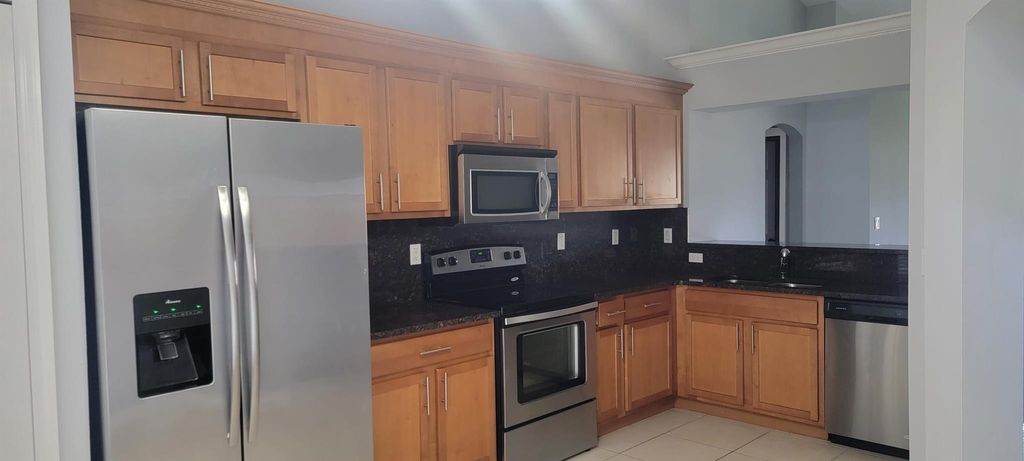 Photo of 437 NE Mainsail Street NE, Port Saint Lucie, FL 34983 (MLS # R11010505)