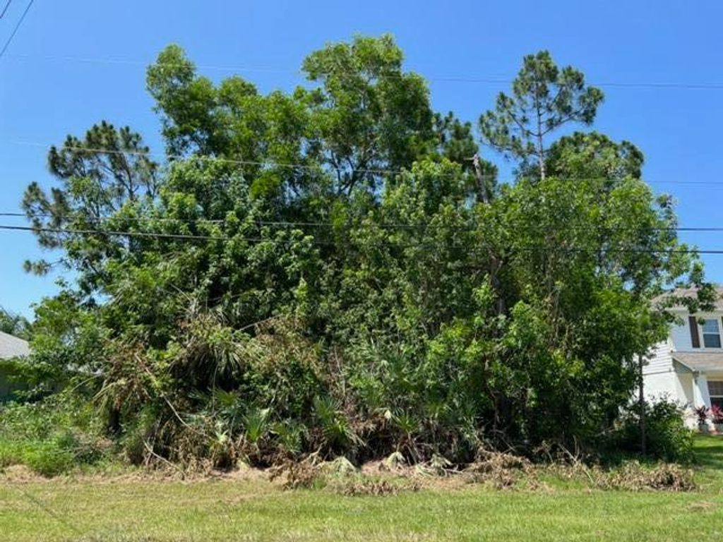 Photo of 5719 NW Zenith Drive, Port Saint Lucie, FL 34986 (MLS # R10809771)