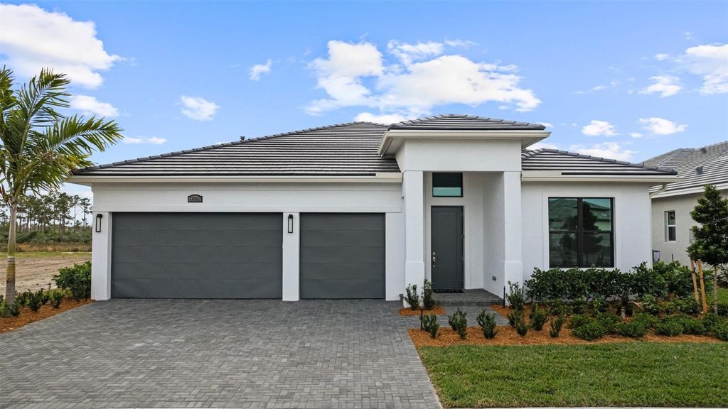 Photo of 13662 SE Grovewood Drive, Port Saint Lucie, FL 34984 (MLS # F10541794)