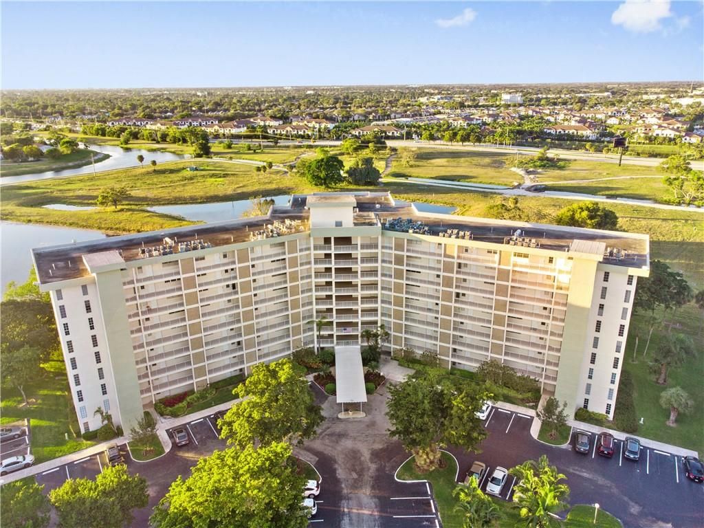Photo of 3090 N Course Dr #910, Pompano Beach, FL 33069 (MLS # F10315341)