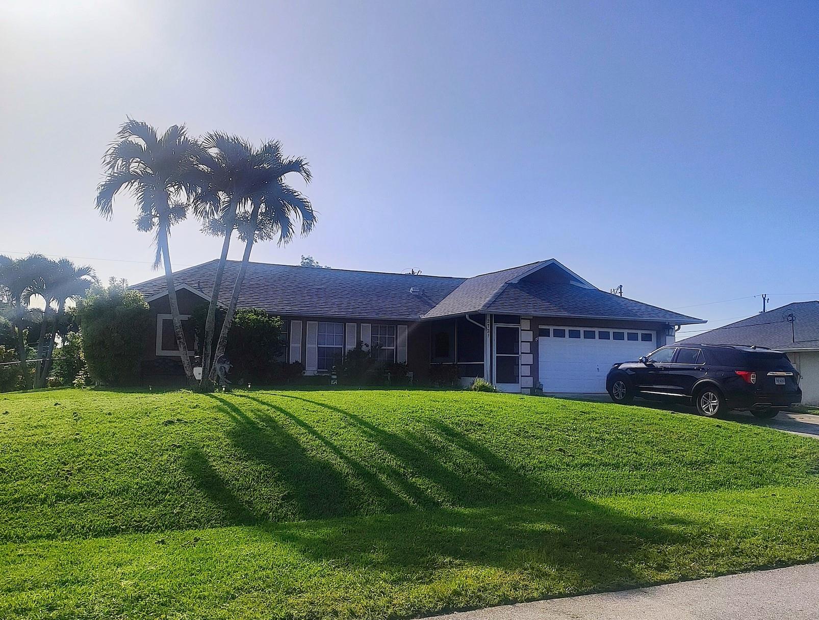 Nestled between the neighborhoods of Trafalgar and Pelican, 2721 SW 3rd Ave offers one of the most centrally located address' in Cape Coral with incredible ease of access to Entertainment, Restaurants, Shopping and anything for your daily needs.
This beautiful appointed 3 Bedroom, 2 Bathroom home offers a very Private Master Suite and two more well sized Bedrooms, perfect for a retired couple with visiting Family, or simply for a Young Family looking for a safe and comfortable way of life in the Florida West Coast.
The double Lot is over 10,000 sqft, providing the perfect backyard to install a Swimming Pool which would compliment the already beautifully flowing Eat-In Kitchen that connects the Dining, Family Room and rear Lanai for entertaining Family & Friends.