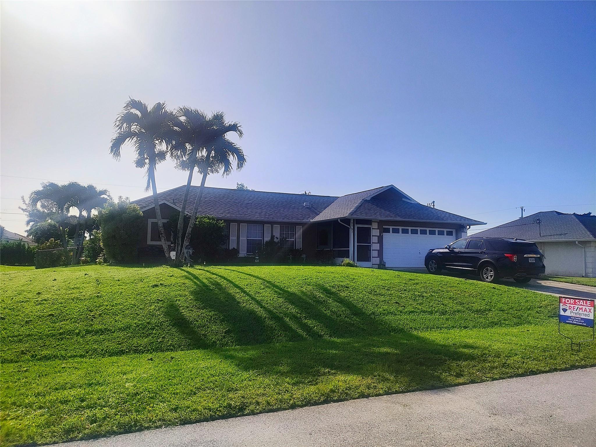 Nestled between the neighborhoods of Trafalgar and Pelican, 2721 SW 3rd Ave offers one of the most centrally located address' in Cape Coral with incredible ease of access to Entertainment, Restaurants, Shopping and anything for your daily needs.
This beautiful appointed 3 Bedroom, 2 Bathroom home offers a very Private Master Suite and two more well sized Bedrooms, perfect for a retired couple with visiting Family, or simply for a Young Family looking for a safe and comfortable way of life in the Florida West Coast.
The double Lot is over 10,000 sqft, providing the perfect backyard to install a Swimming Pool which would compliment the already beautifully flowing Eat-In Kitchen that connects the Dining, Family Room and rear Lanai for entertaining Family & Friends.