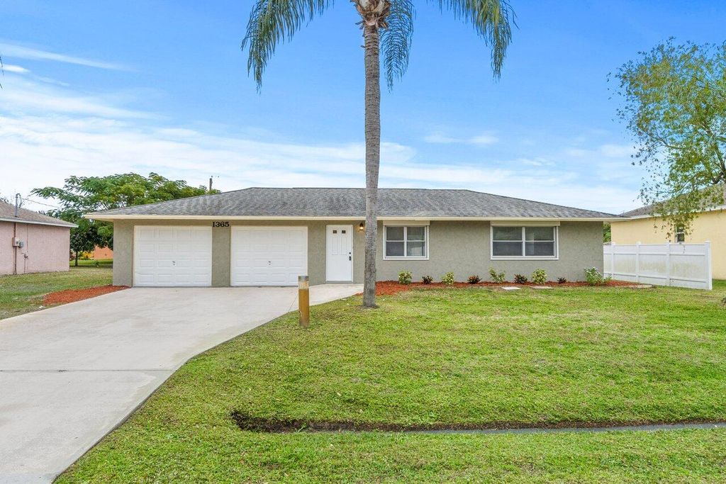 Photo of 1365 SE Sandia Drive, Port Saint Lucie, FL 34983 (MLS # R10772955)