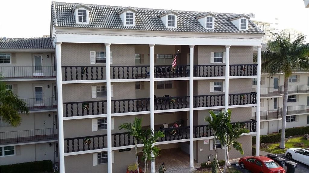 Photo of 440 Paradise Isle Boulevard #303, Hallandale Beach, FL 33009 (MLS # B26019853)