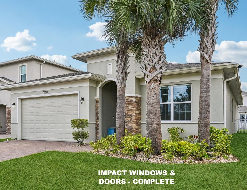 Photo of 1600 NW Vivanco Street, Port Saint Lucie, FL 34986 (MLS # B26001486)