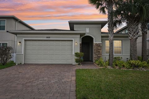 Photo of 1600 NW Vivanco Street, Port Saint Lucie, FL 34986 (MLS # B26001486)